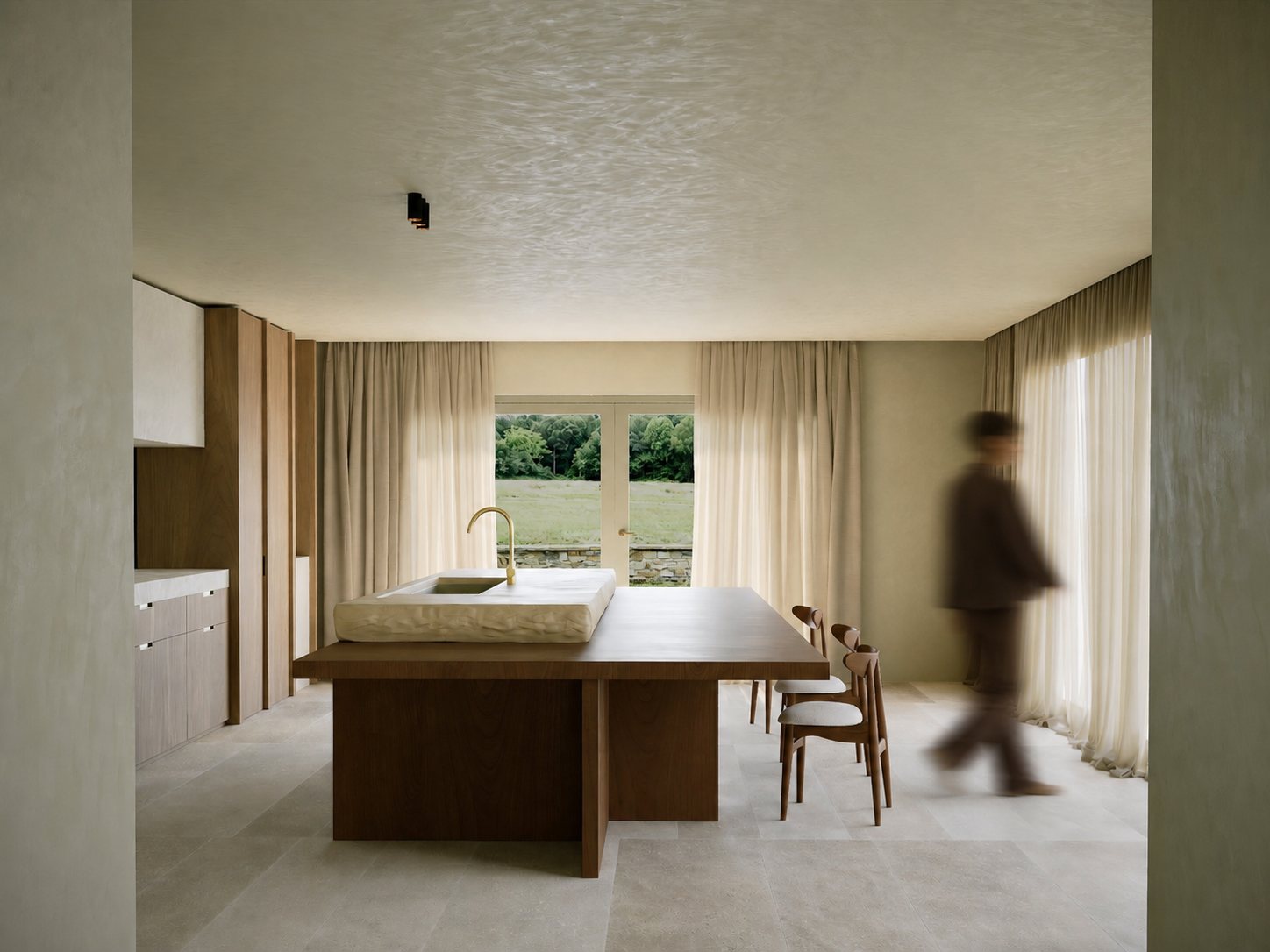 Minimalist kitchen with carved stone sink and walnut table